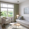 living room with a large window and open spaces