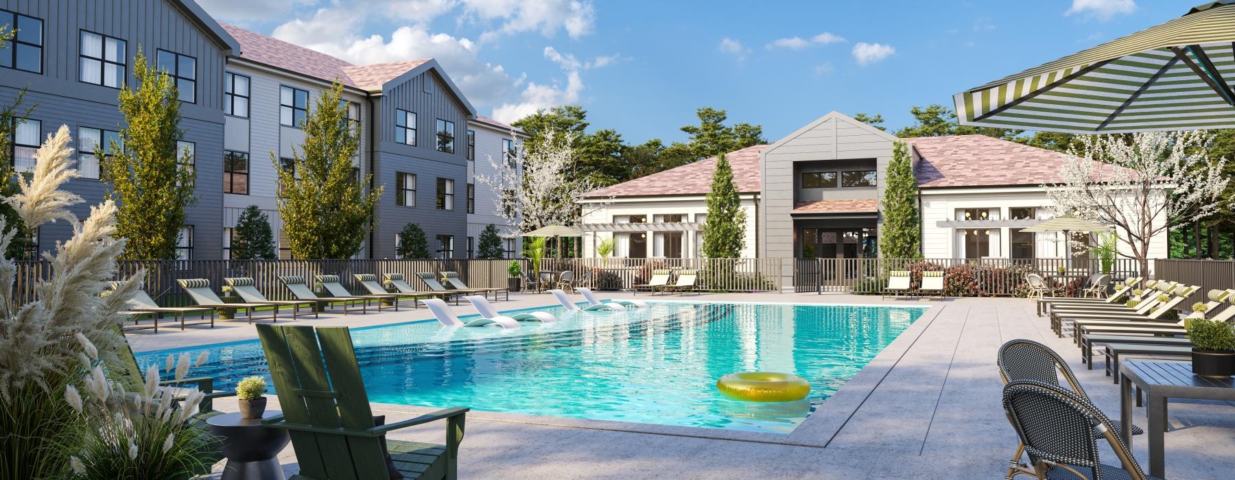 a swimming pool with chairs around it