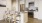 a kitchen with white cabinets