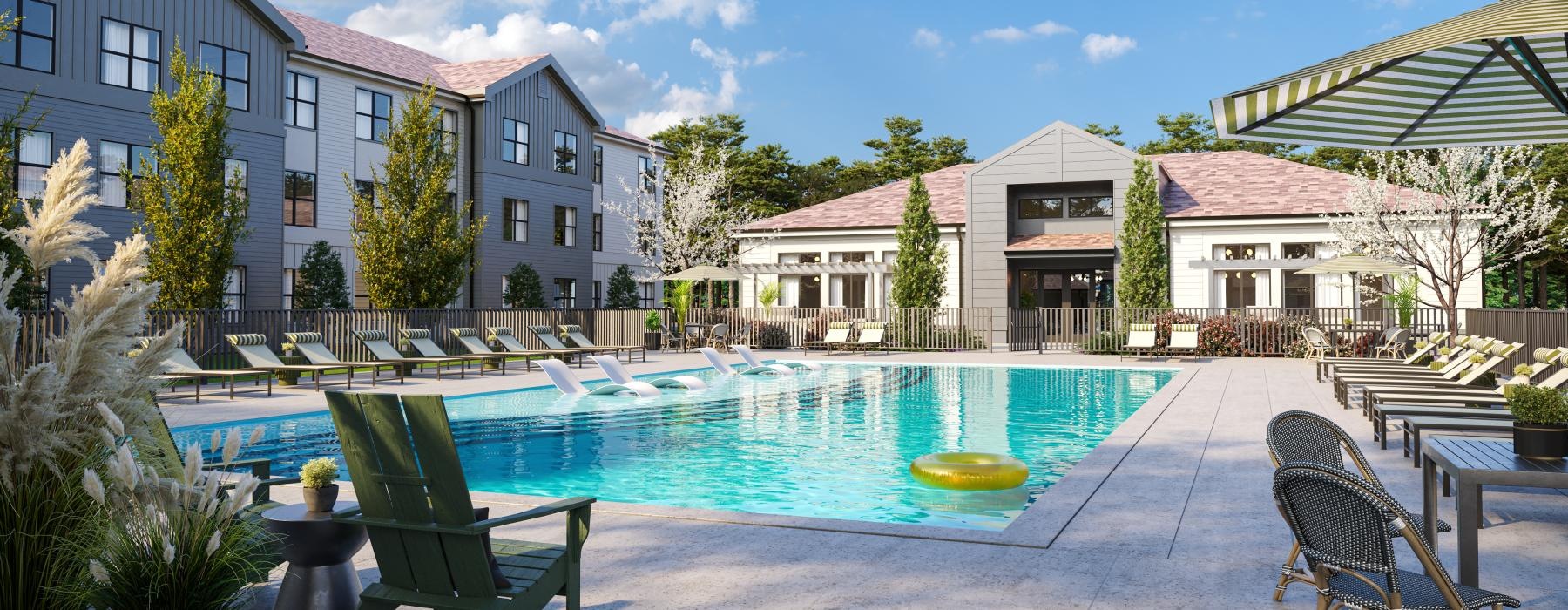 a swimming pool with chairs around it